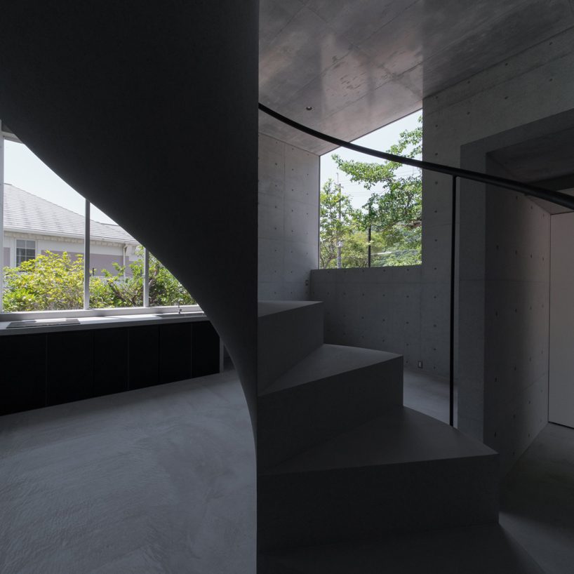 kazunori fujimoto architects completes house in ashiya, japan, with concrete spiral staircase