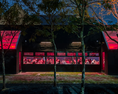 an obsolete radiator repair shop has become the minimalist 'magnet' restaurant in detroit