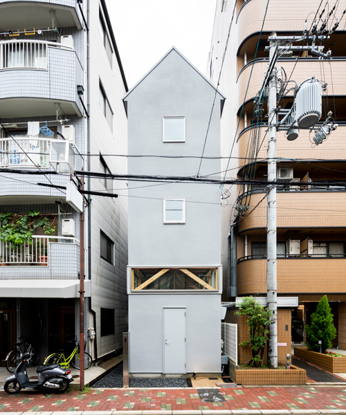 this light-filled house in osaka is sandwiched between two apartment buildings