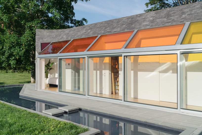 cocoon cottage in the hamptons filters sun through colored skylights