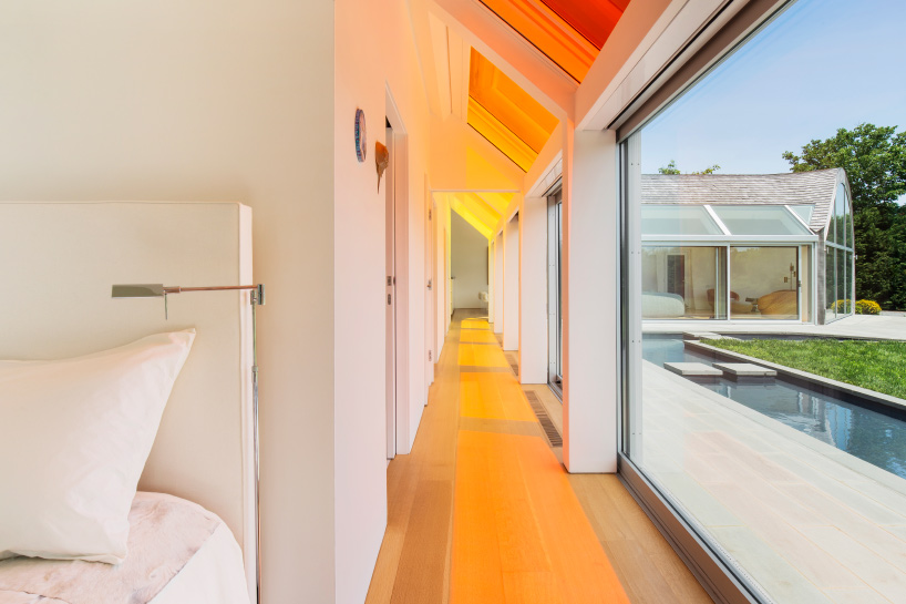 cocoon cottage in the hamptons filters sun through colored skylights
