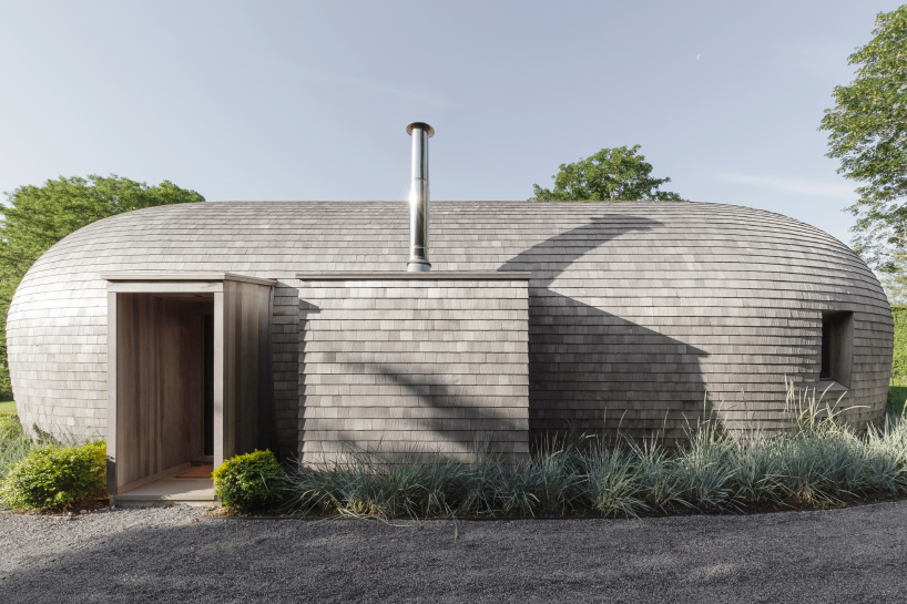 cocoon cottage in the hamptons filters sun through colored skylights