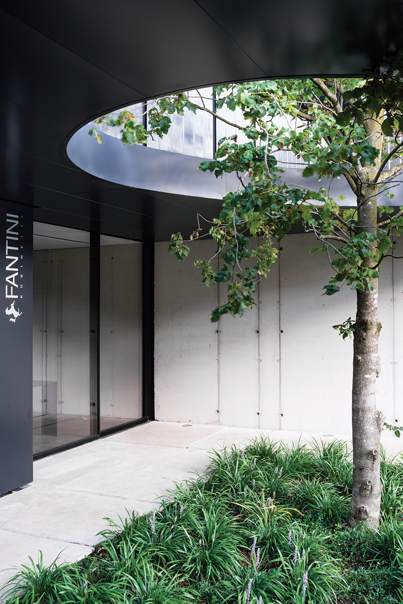 lissoni architettura expands fantini headquarters on the banks of lake orta
