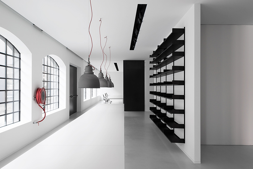 lissoni architettura expands fantini headquarters on the banks of lake orta