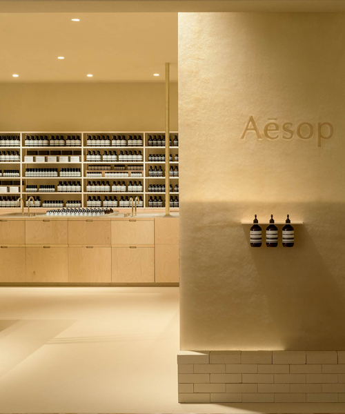 schemata architects creates 'soft beige mirage' inside aesop store in japan