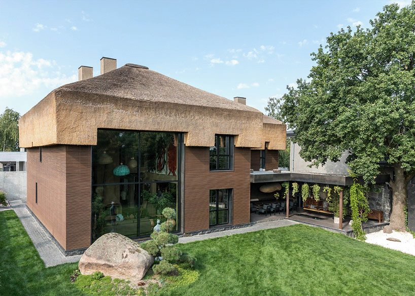 a thatched roof tops sergey makhno's shkrub house in the suburbs of kiev designboom