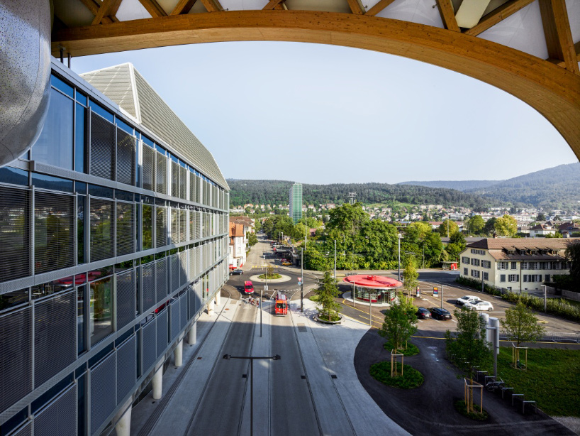 Shigeru Ban covers Swatch headquarters in snaking timber vault