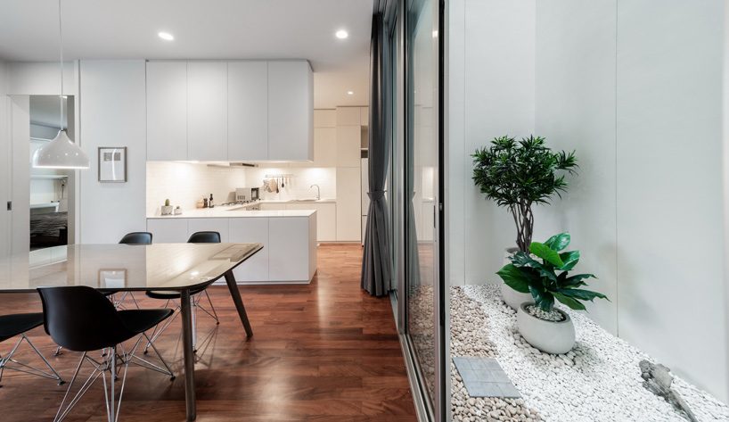 Stu/D/O wraps baan 33 apartment in expanded aluminum + solid walls in bangkok