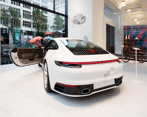 daniel arsham parks eroded porsche 992 in 'the house' at selfridges