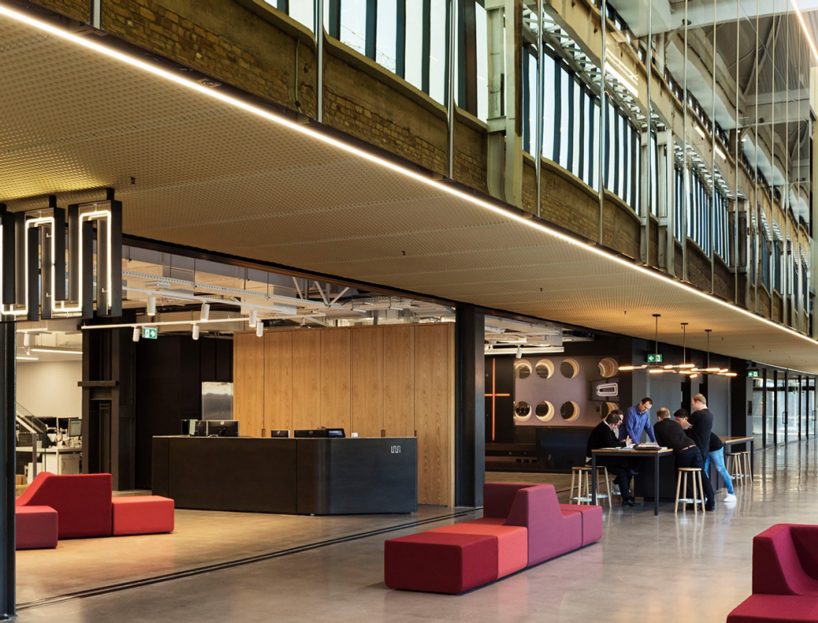 warren and mahoney transforms new zealand warehouse into three-story office building