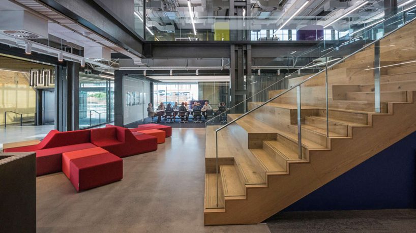 warren and mahoney transforms new zealand warehouse into three-story office building