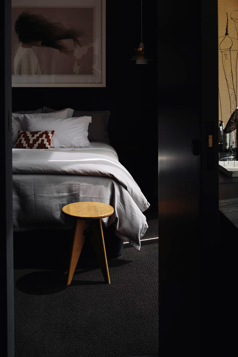 fearon hay architects builds house in new zealand's alps as cluster of blackened volumes