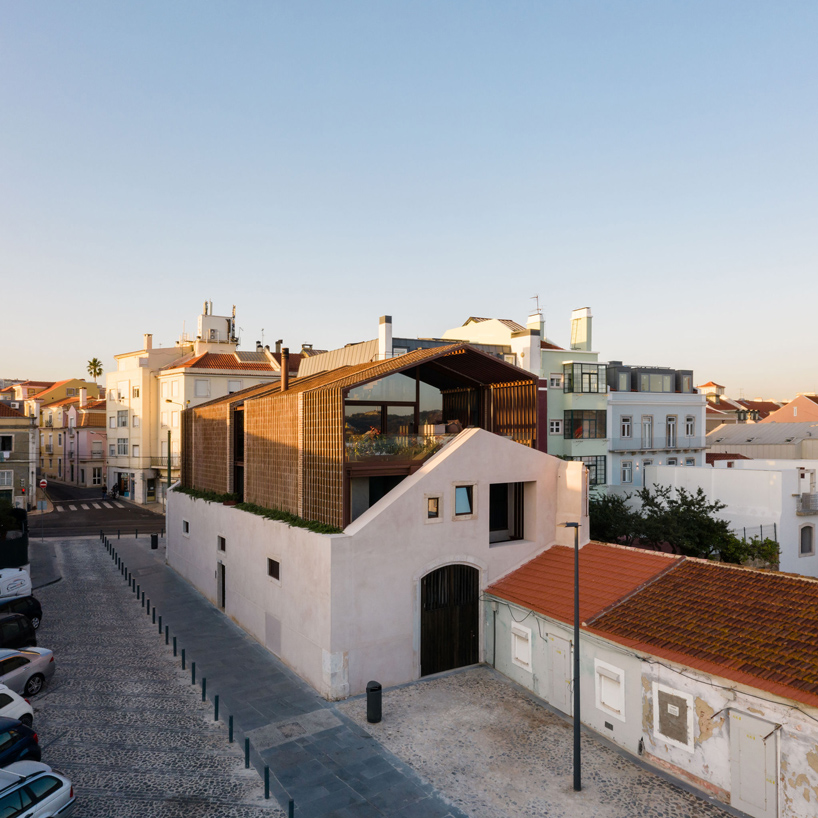 antonio costa lima designs casa altinho with nesting brickwork volumes