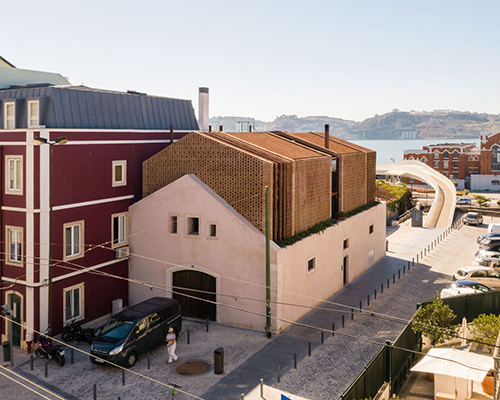 casa altinho overlooks lisbon waterfront with nesting volumes of delicate brickwork