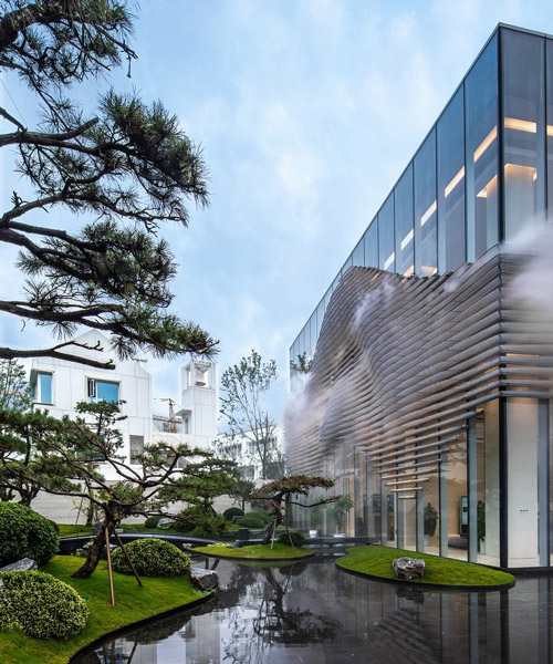 aoe adds ethereal fog and rippled louvers to building in china