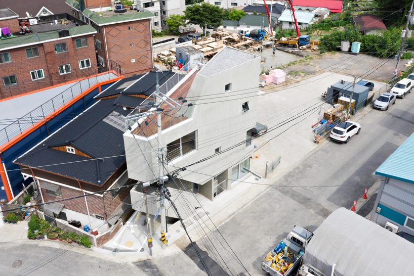 architects H2L builds concrete slit house on a triangular lot in south korea