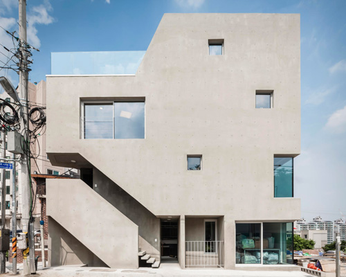 architects H2L builds concrete slit house on a triangular lot in south korea