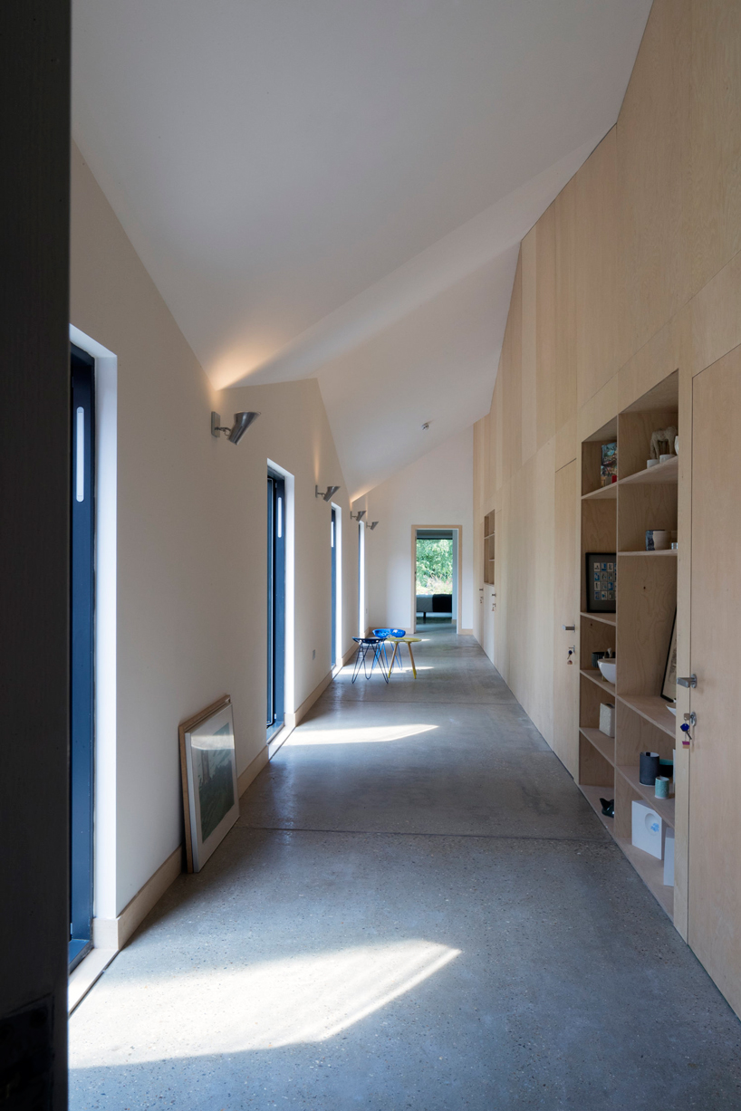 blee halligan architects extends five acre brick barn with shingle-clad B&B in the UK