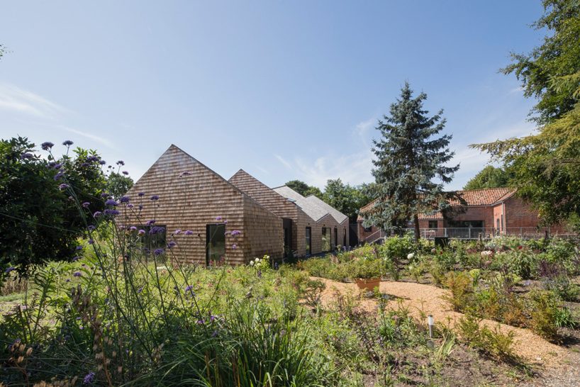 blee halligan architects extends five acre brick barn with shingle-clad B&B in the UK