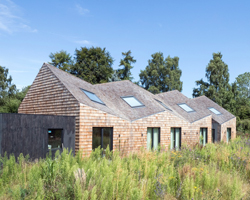 blee halligan architects extends five acre brick barn with shingle-clad B&B in the UK