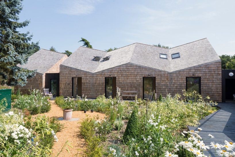 blee halligan architects extends five acre brick barn with shingle-clad B&B in the UK