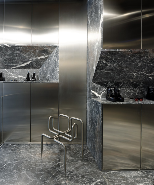 didier faustino mixes marble + steel within the enfants riches déprimés boutique in paris