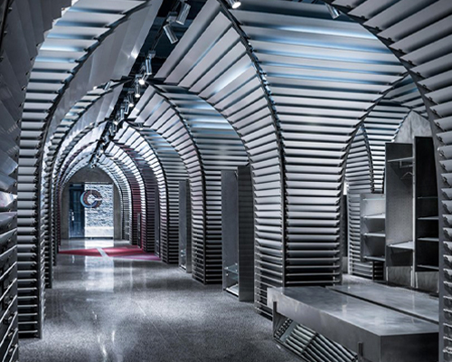 dongqi design creates metal clad columns for concept store renovation in shanghai
