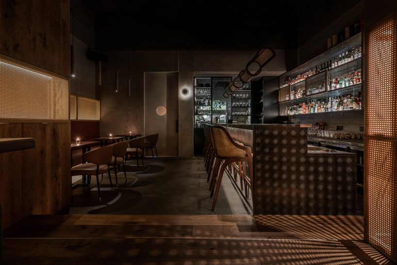 GE space design combines cocktail workshop with hidden bar behind it in chengdu, china