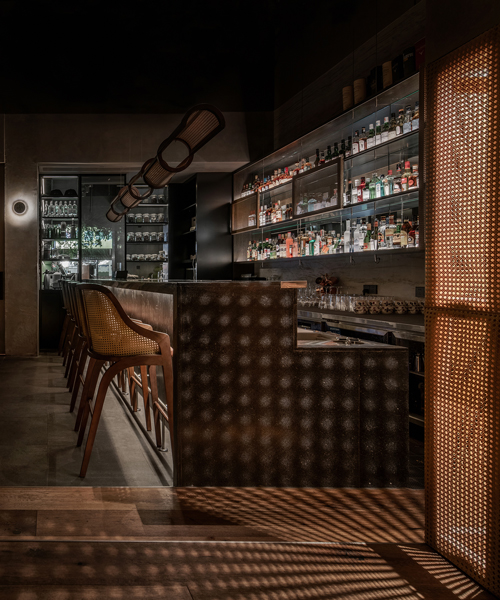 GE space design combines cocktail workshop with hidden bar behind it in chengdu, china