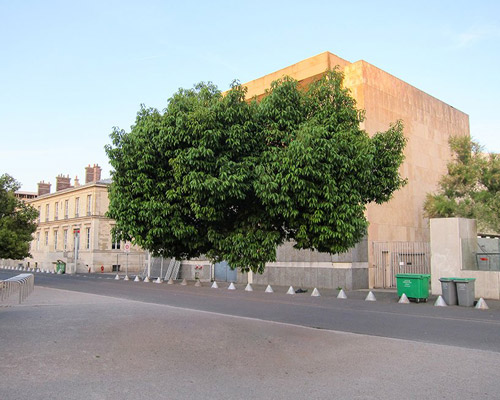 hugo livet's latest photography series depicts cityscapes with floating trees