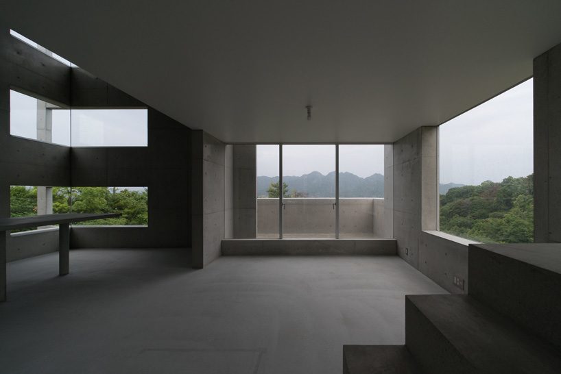 kazunori fujimoto architects completes all-concrete house on a sloping