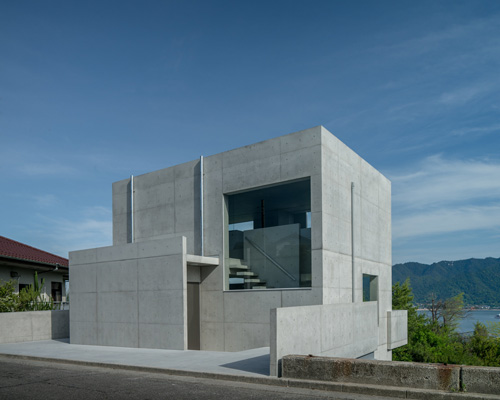 kazunori fujimoto architects completes all-concrete house on a sloping site in ajina, japan