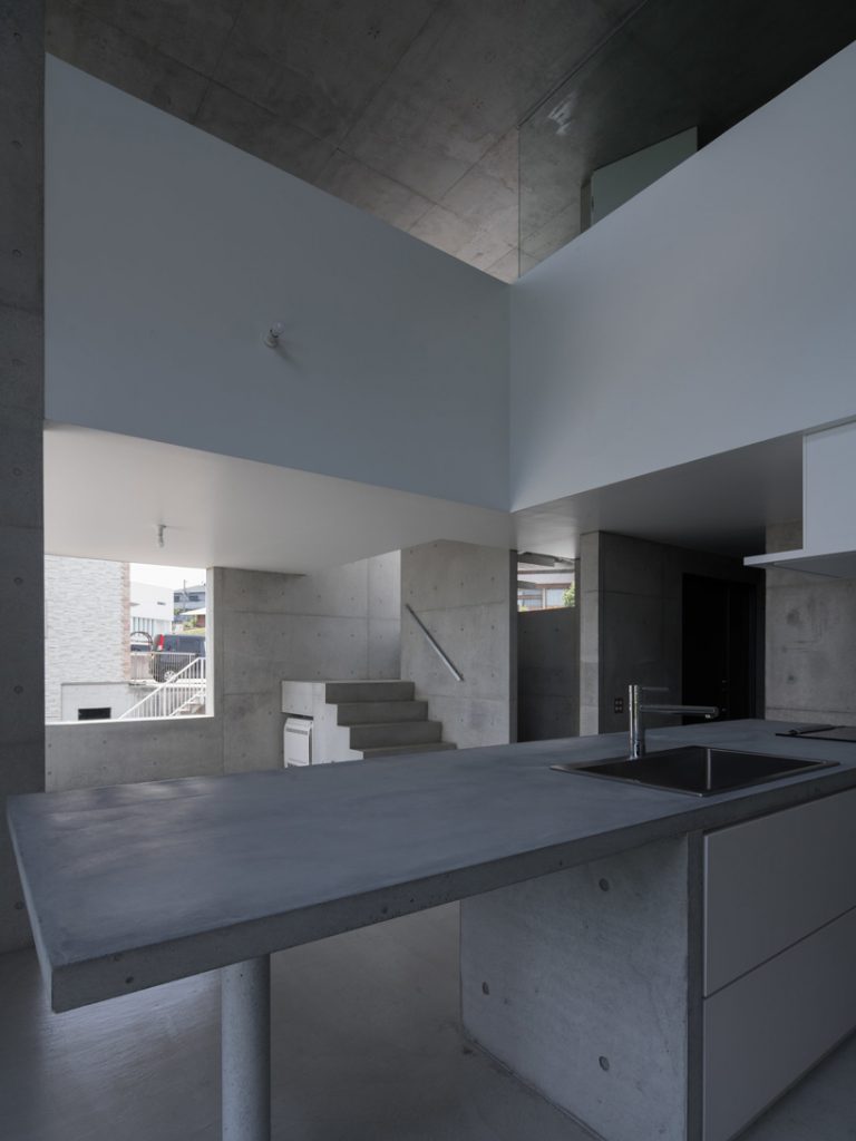 kazunori fujimoto architects completes all-concrete house on a sloping ...