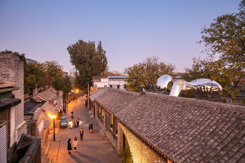 MAD architects builds 'hutong bubble' into fabric of beijing neighborhood