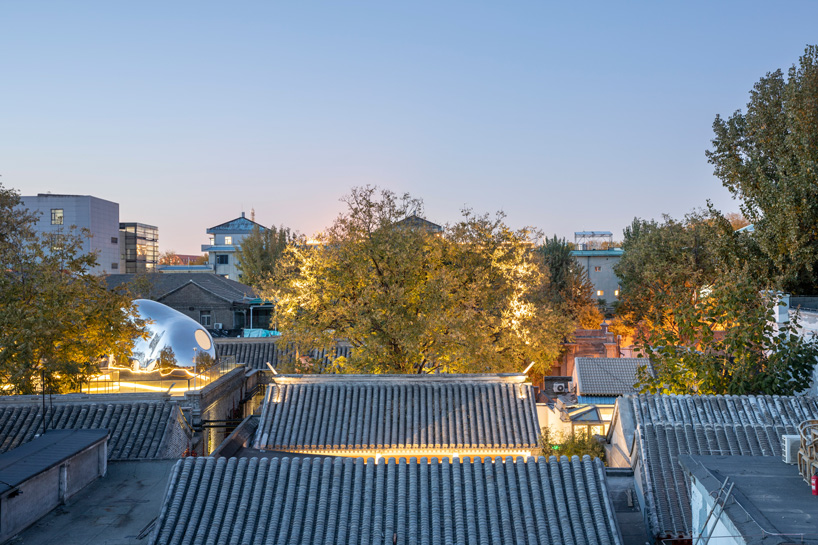 MAD architects builds 'hutong bubble' into fabric of beijing neighborhood