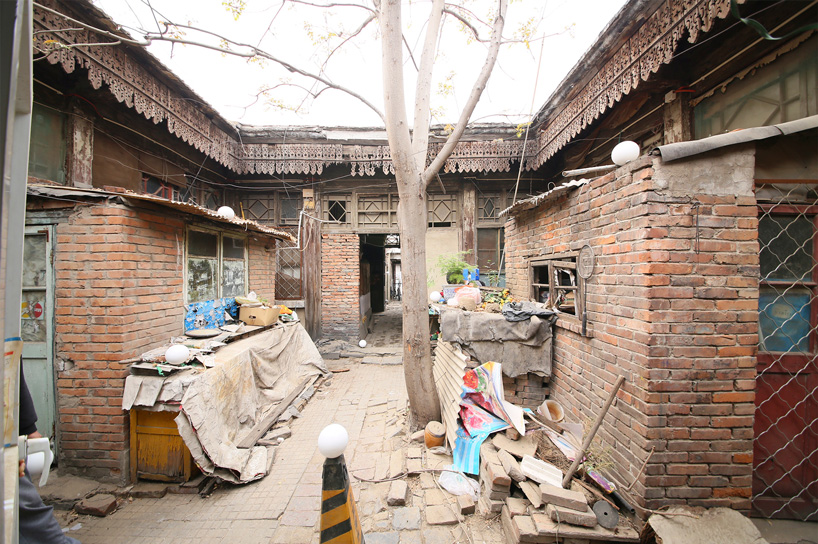 MAD architects builds 'hutong bubble' into fabric of beijing neighborhood