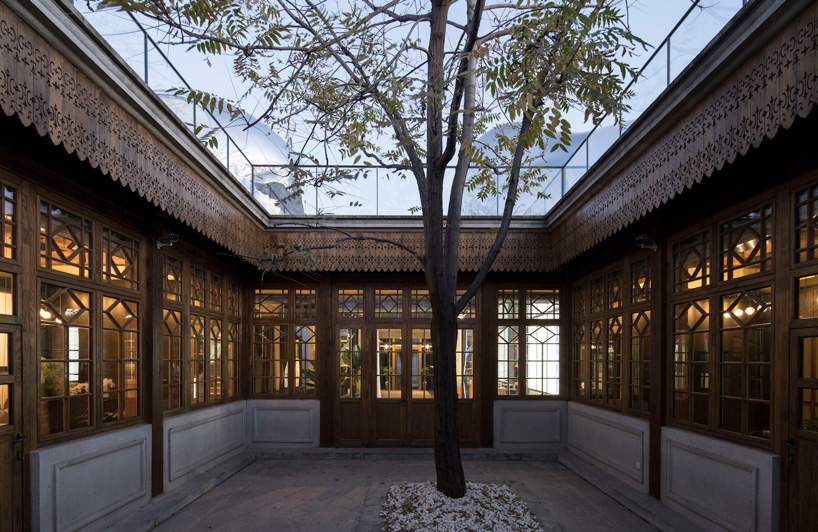 MAD architects builds 'hutong bubble' into fabric of beijing neighborhood