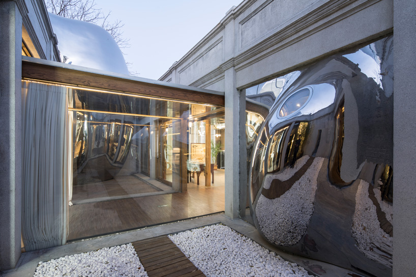 MAD architects inserts hutong bubble into fabric of historic beijing neighborhood MAD architects inserts hutong bubble into fabric of historic beijing neighborhood