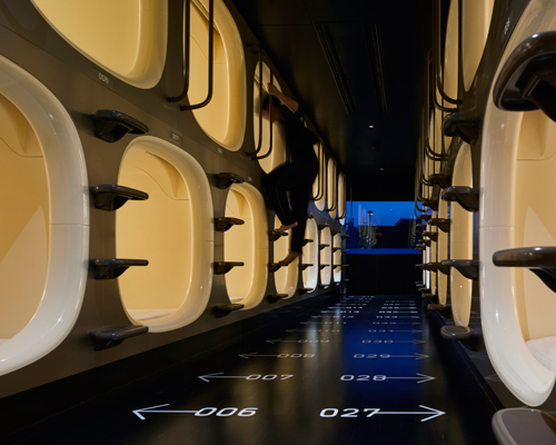 naruse inokuma 'reinvents' the capsule hotel by considering each part of a guest's stay