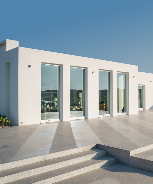 react architects roots 'the gaze' house into idyllic greek island landscape