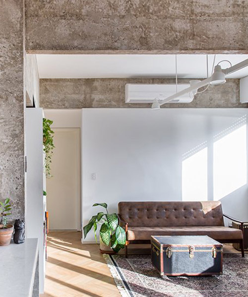 rodrigo bocater renovates 1960's concrete apartment into musician's home in rio de janeiro