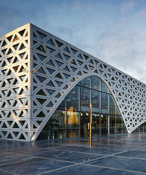 silvio d'ascia architecture covers high-speed train station in traditional arabian pattern in morocco