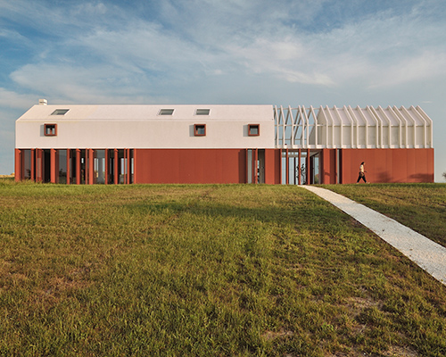 sweeping views permeate simone subissati's fragmented 'border crossing house' in italy