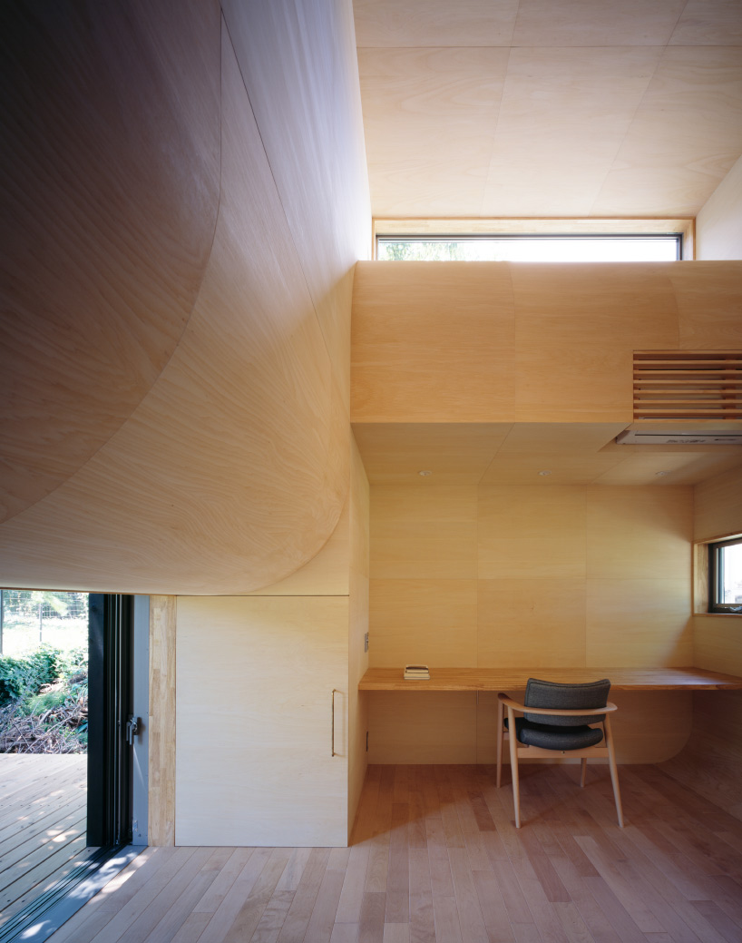 tunnel by takehiko suzuki architects is a small hut in tokyo clad in charred japanese cedar