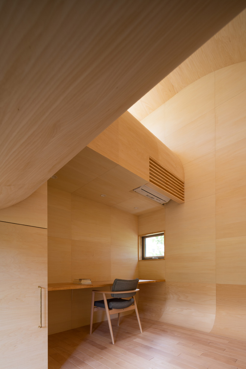 tunnel by takehiko suzuki architects is a small hut in tokyo clad in charred japanese cedar