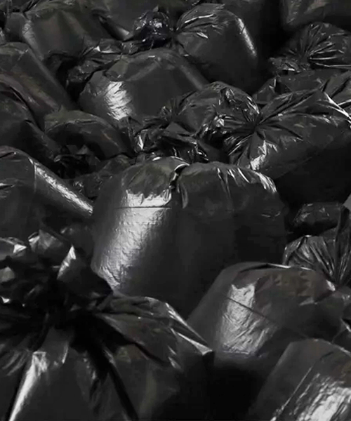 the krank installs 500 plastic trash bags in berlin to highlight our consumerist society