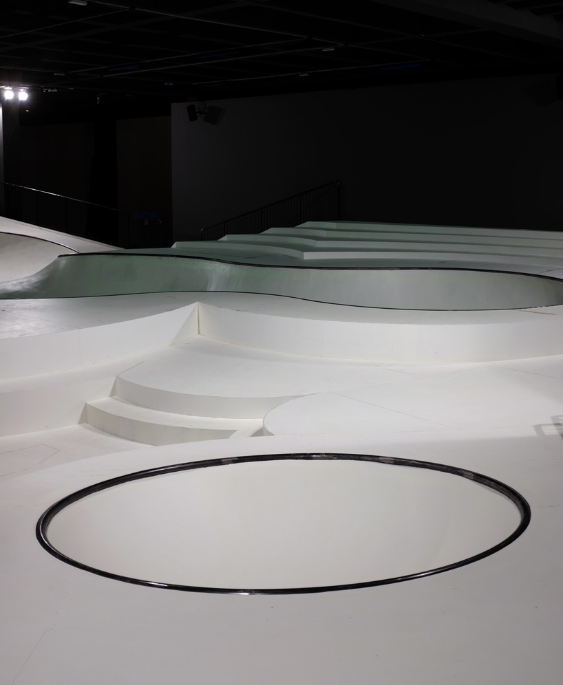 la triennale di milano installs glow-in-the-dark skatepark inside museum