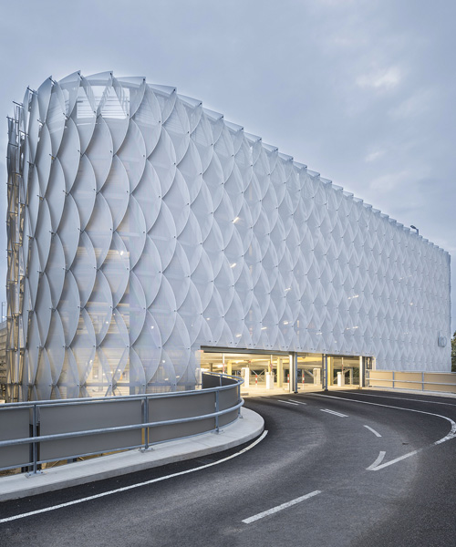 wulf architekten designs perforated metal façade for cologne's parking garage P22A