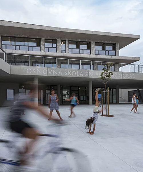 x3m builds a new school in croatia to incorporate large outdoor spaces for the community