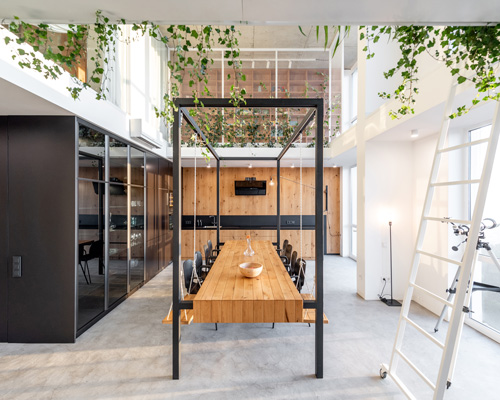 o. m. shumelda develops apartment around double-height central space in ukraine